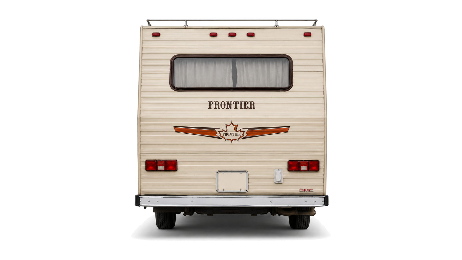 The 1984 Frontier Class C motorhome seen head-on from the rear